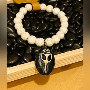 Bracelet-The beaded Plague ceramic beads w plague doctor mask charm 7.5 inches